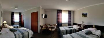 Фото номера Четырехместный номер Отель Hotel Pawłowski г. Згожелец 4